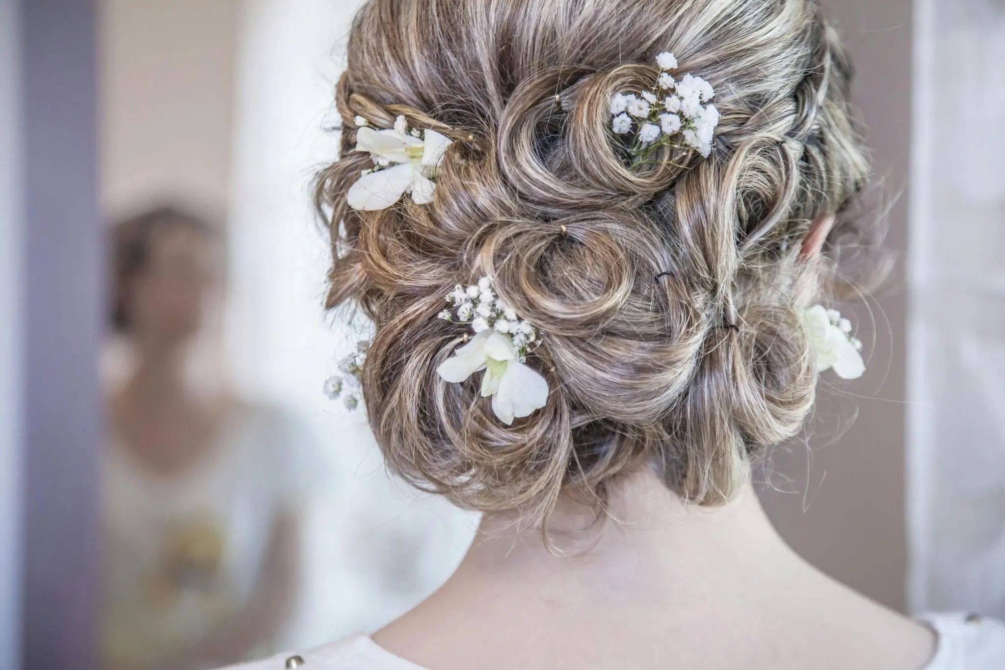 https://www.pexels.com/photo/woman-wearing white floral hair vine