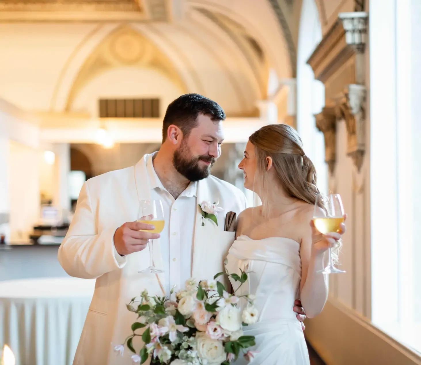 white suit and bride